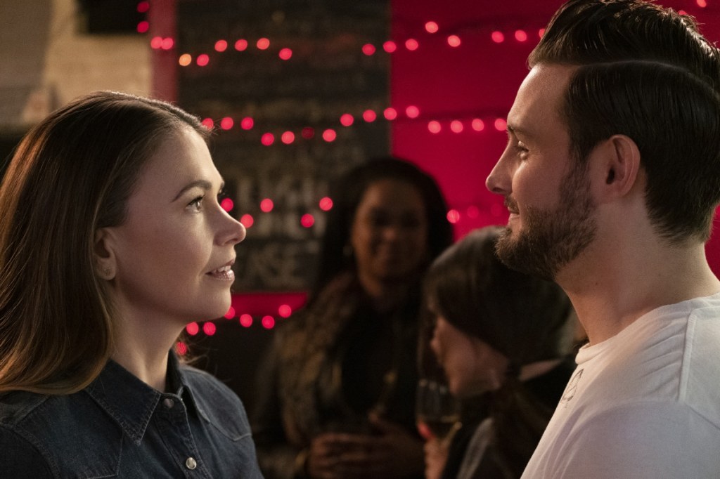 Liza (played by Sutton Foster) looking at Josh (played by Nico Tortorella) in the finale episode of "Younger"