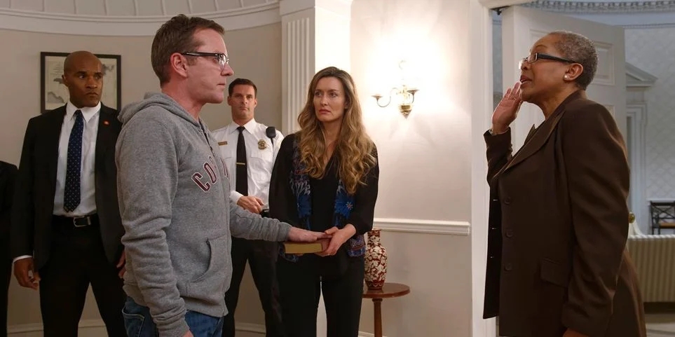 Tom Kirkman (played by Kiefer Sutherland) swearing in as the new president of the United States while Alex (played by Natascha McElhone) and Mike (played by LaMonica Garrett) watch on in the pilot episode of "Designated Survivor"